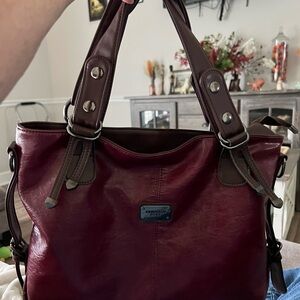 Chic Burgundy Tote with Brown Details. Hobo style bag of vegan leather. XGBL.